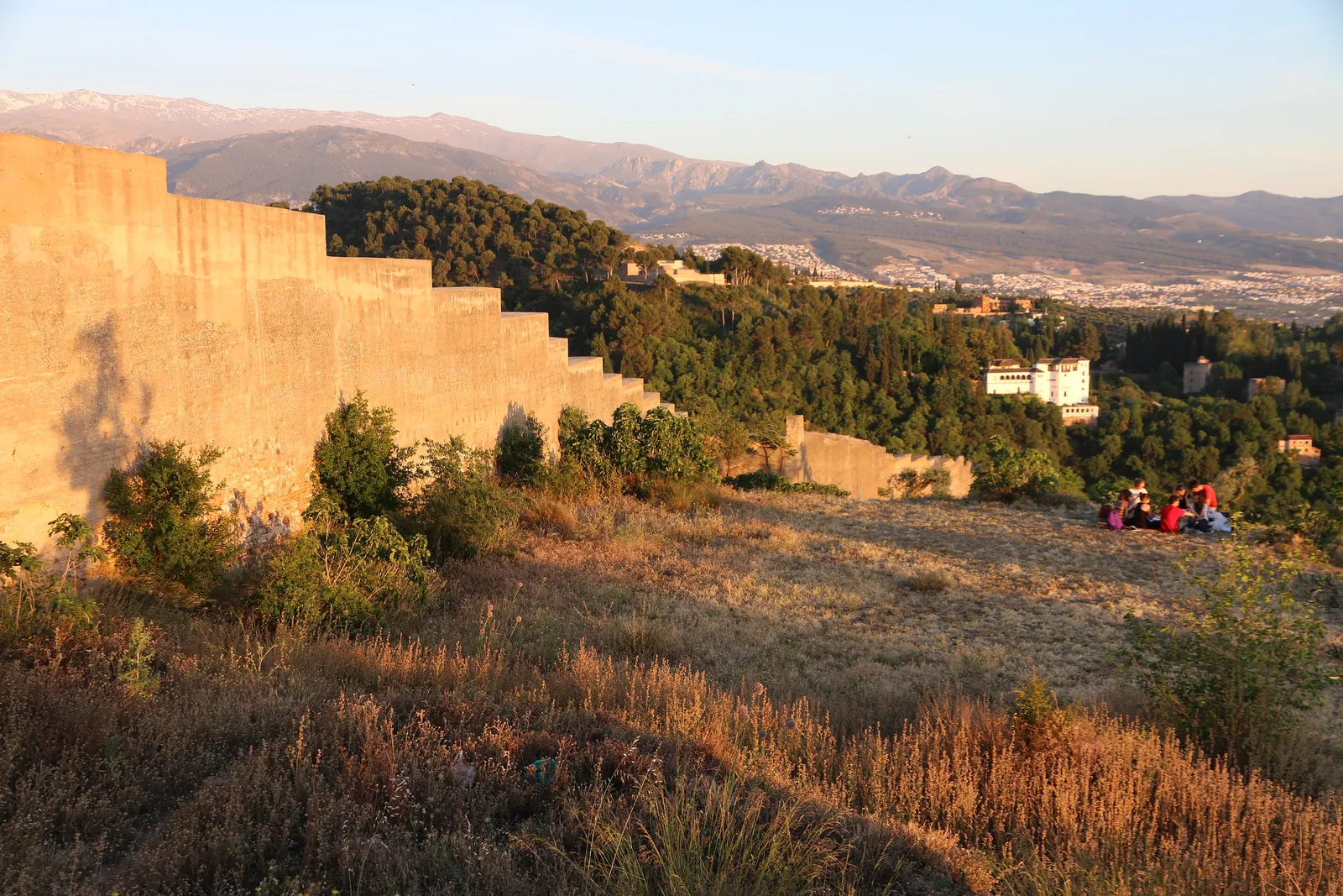 Evening light on a Moorish wall at the top of the Sacromonte hill, with the Sierra Nevada in the distance; a general photograph of the hill
